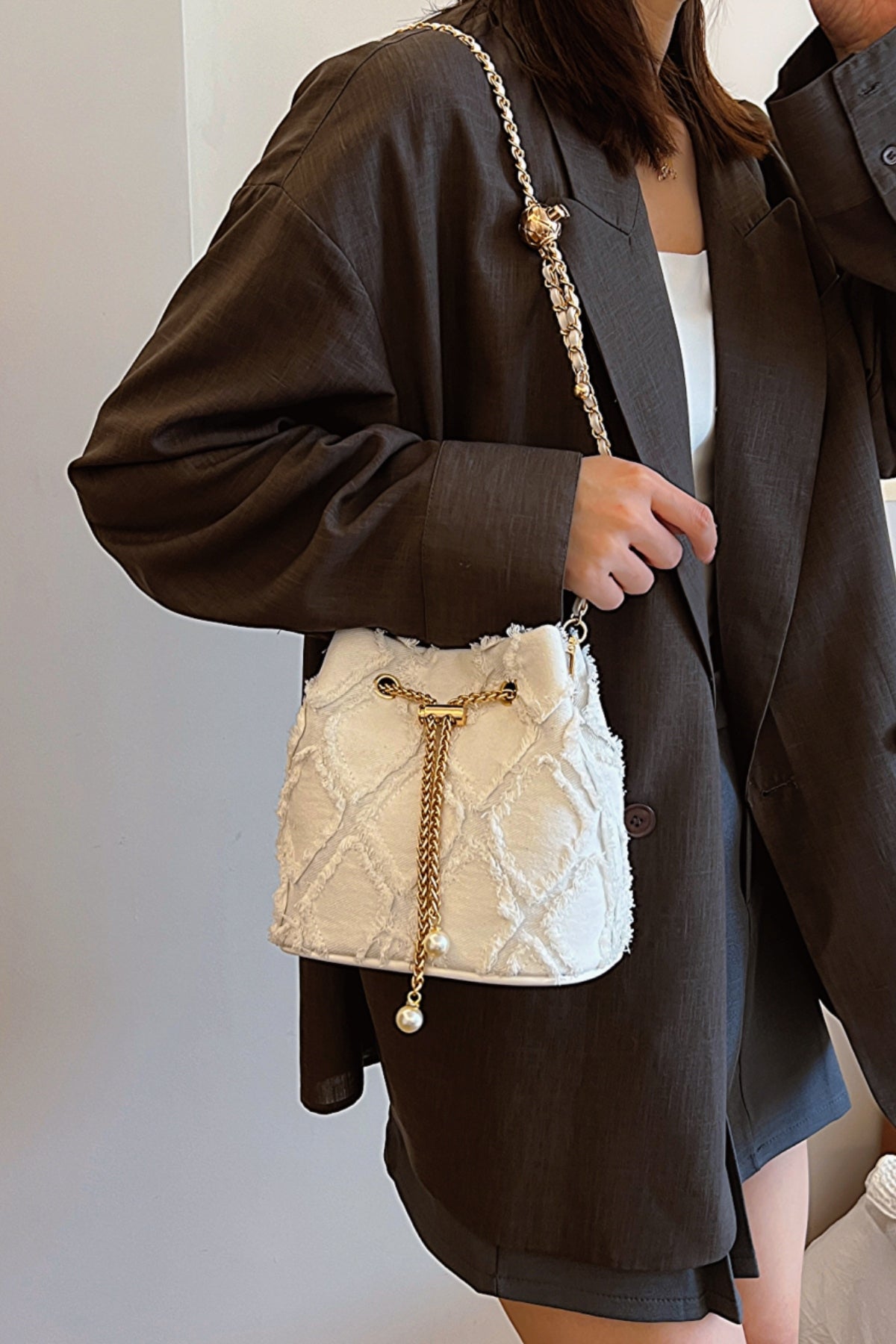 Chain Drawstring Raw Edge Denim Bucket