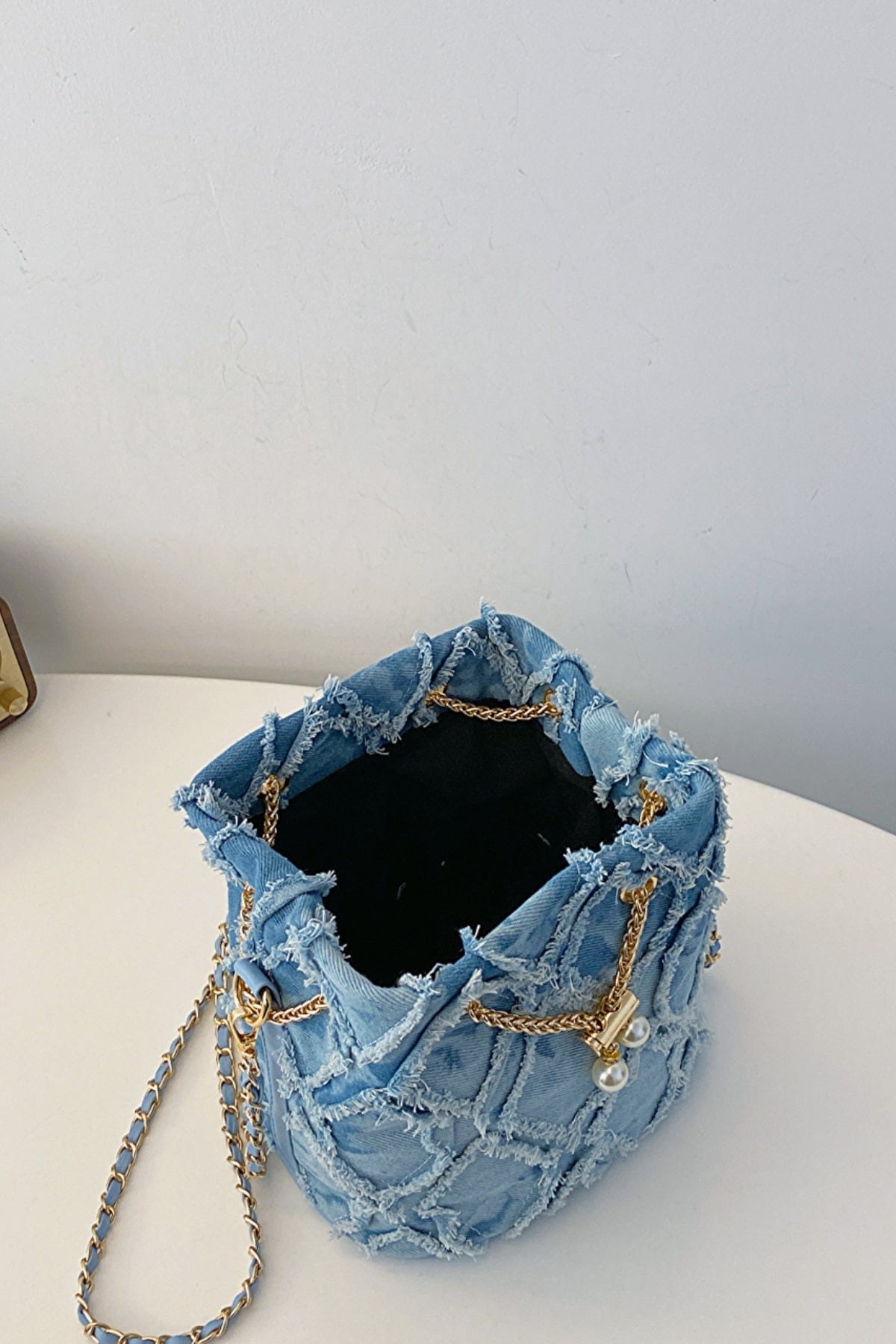 Chain Drawstring Raw Edge Denim Bucket